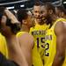 Michigan sophomore Trey Burke, sophomore Jon Horford and fifth-year senior Corey Person celebrate beating Florida to win the NCAA South Regional Championship and advancing to the Final Four at Cowboys Stadium on Sunday, March 31, 2013. Melanie Maxwell I AnnArbor.com